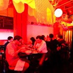 Having some eats at a hightop table at Danny Bowien's Mission Chinese Food NYC.