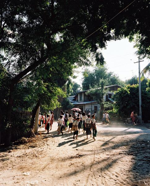 Children walk home from school in Bagan, Myanmar.