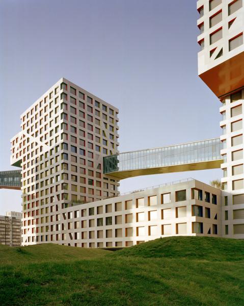 The Linked Hybrid project in Beijing, designed by Architect Steven Holl. The project is a mixed-used Residential and Retail space that focuses on green spaces and pedestrians. Heating and cooling are provided by geo-thermal wells.