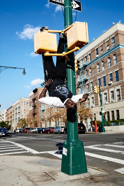 Prophecy working out on a corner in Harlem, New York.