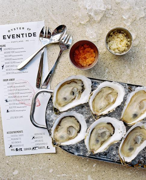 Fresh oysters at the Eventide Oyster Co Portland Maine. Oysters featured here are four Norumnega (Damariscotta, Maine), four John's River (South Bristol, Maine), two Beau Soleil (New Brunswick), two Shigoku (Washington) with horseradish ice and tabasco ice.