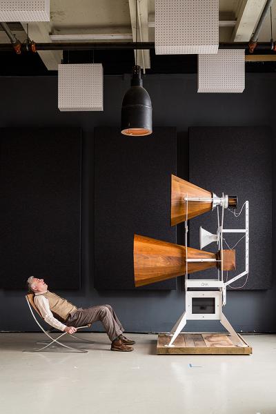 Jonathan Weiss leans back in the showroom of Oswalds Mill Audio (OMA) located in Dumbo, New York City. Pictured with Jonathan are the Imperia Speakers.