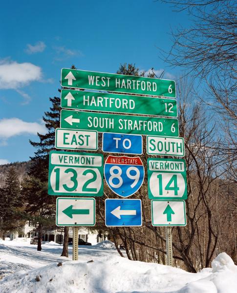 Highway signs in Woodstock, Vermont.