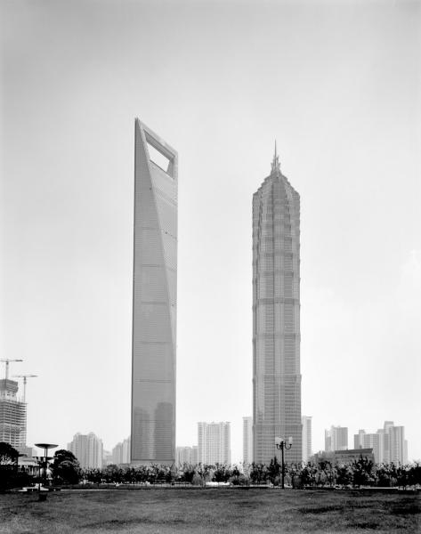 The Shanghai World Financial Center rises from the Lujiazui financial district of Pudong, in Shanghai. Also known as the Mori Building, after the Japanese development company that is building it, the bottle-opener-shaped structure rises 101-stories (492m) and will house the Park Hyatt hotel.