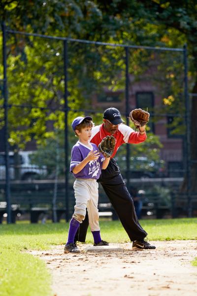 Baseball in Marcus Garvey Park, Harlem, New York.