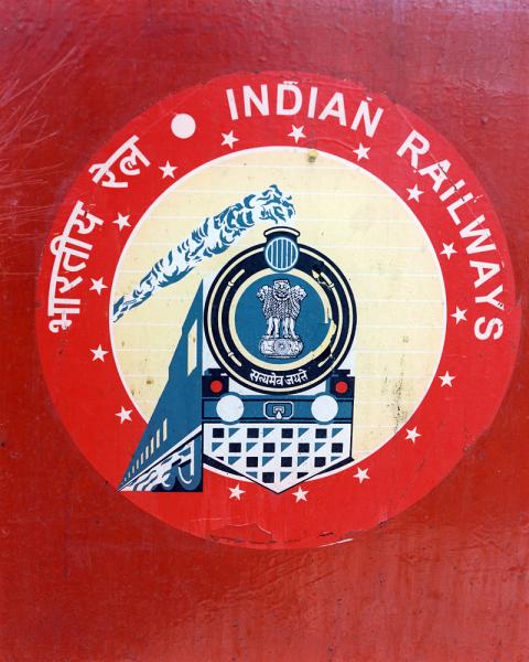 Signage of the India Railways Company, as seen from the Golden Chariot Train.
