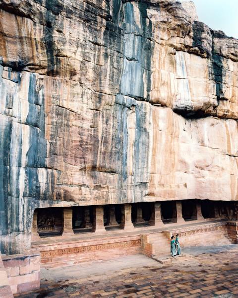 Walking outside of the cave temples in Badami, in Karnataka Province, India.