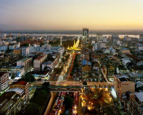 Yangon's Sule Pagoda at dusk as seen from Trader's Hotel (now the 
