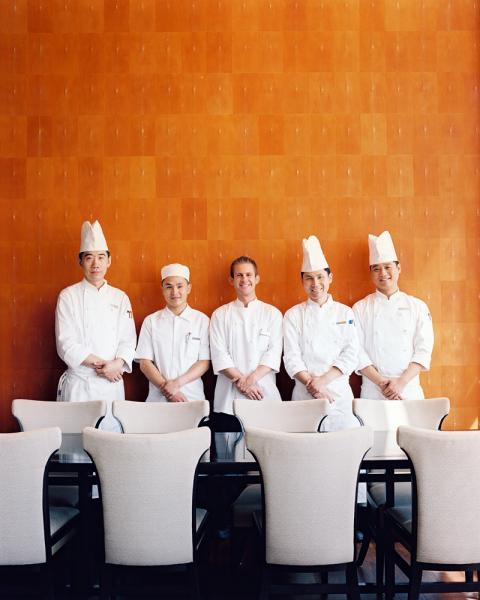 Chef Gerhard Passrugger and his team at Shanghai's Park Hyatt hotel, located in the Shanghai World Financial Center in Pudong's Lujiazui district. The building was constructed by Japan's Mori Corporation and towers 492m over the city.