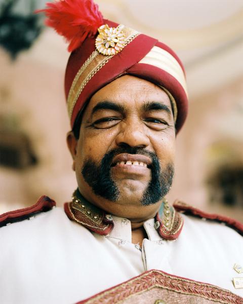 A doorman at the Leela Palace Hotel in Bangalore, India.