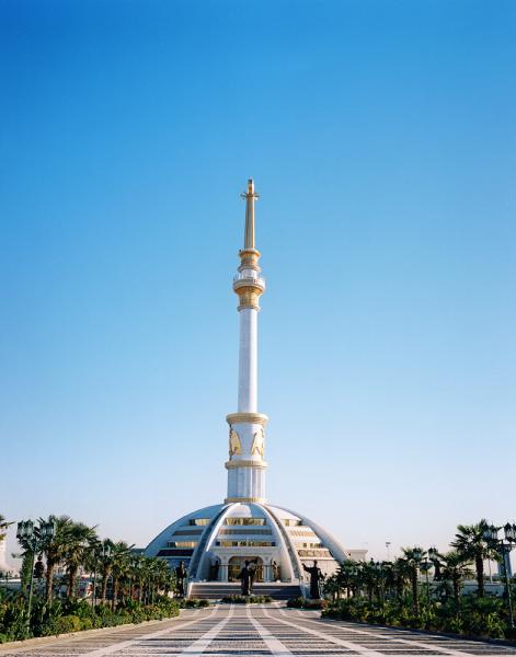 The Independence Monument in Ashgabat, Turkmenistan. The base of the monument was inspired by the round tents, called yurts or gers, that the nomadic tribes of Turkmenistan live in. Locally however, it is known as the Toilet Plunger.